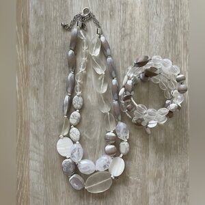 Necklace. Double row of white and clear resin beads.